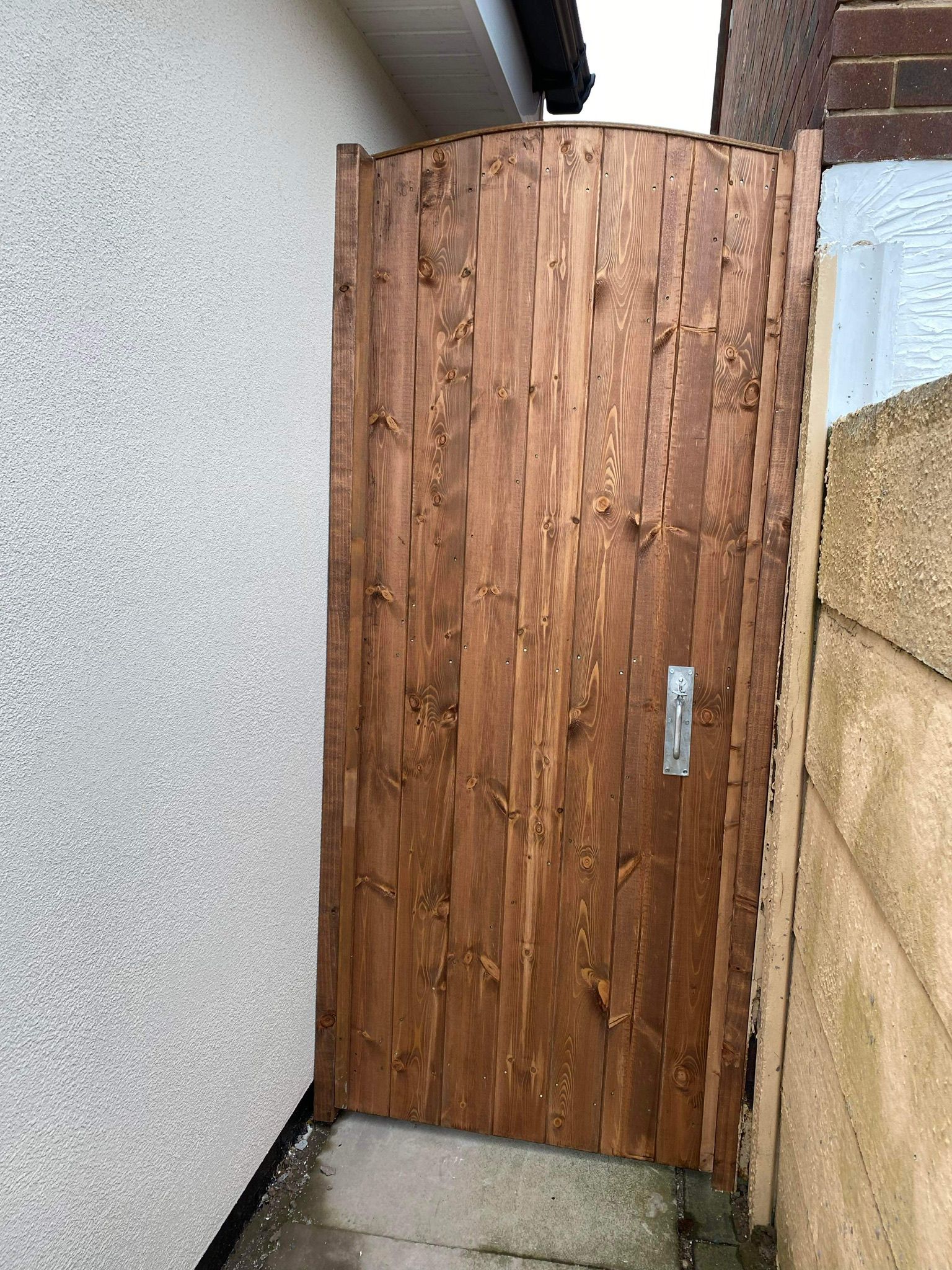 Custom wooden gate installation